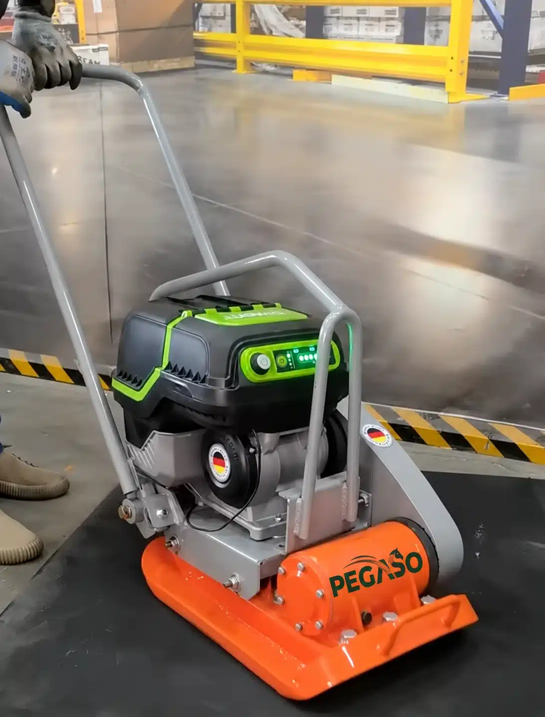 Battery-powered plate compactor charging — 800x600
